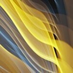Flowing abstract waves in shades of yellow, blue, and black create a dynamic, fluid pattern against a dark background.